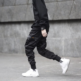 Men Tactical Joggers Pants Multi-pocket Elastic Waist Harem Pants Men Hip Hop Streetwear Ribbons Design Functional Cargo Trouser