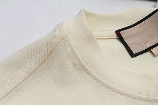 2025 Early Spring New GU Home Dissolved Melted Letter Printed Men's and Women's Short sleeved T-shirt Top