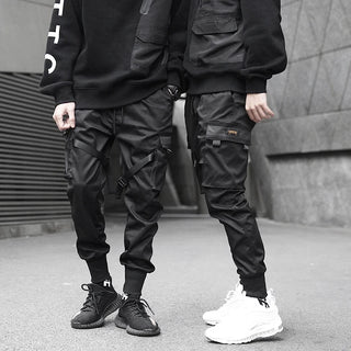 Men Tactical Joggers Pants Multi-pocket Elastic Waist Harem Pants Men Hip Hop Streetwear Ribbons Design Functional Cargo Trouser